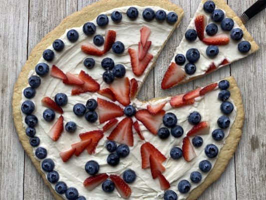 Frosted cookie desert pizza