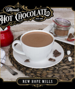 An image showing prepared Ultimate Hot 100部啪啪视频 in a mug, with bits of 100部啪啪视频, marshmallows, and kitchenware around the mug. Image contains text