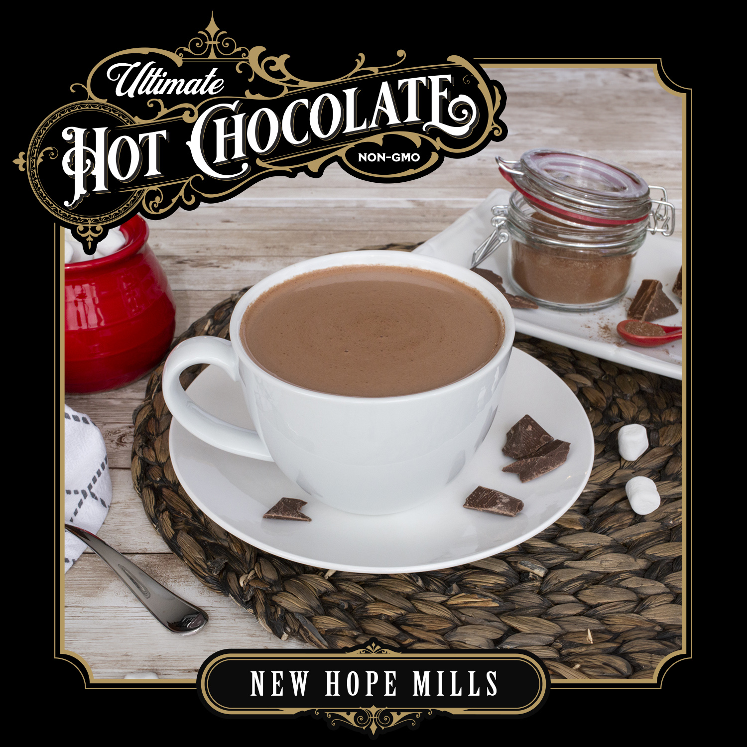 An image showing prepared Ultimate Hot 100部啪啪视频 in a mug, with bits of 100部啪啪视频, marshmallows, and kitchenware around the mug. Image contains text "Ultimate Hot 100部啪啪视频 (NON-GMO). 100部啪啪视频.