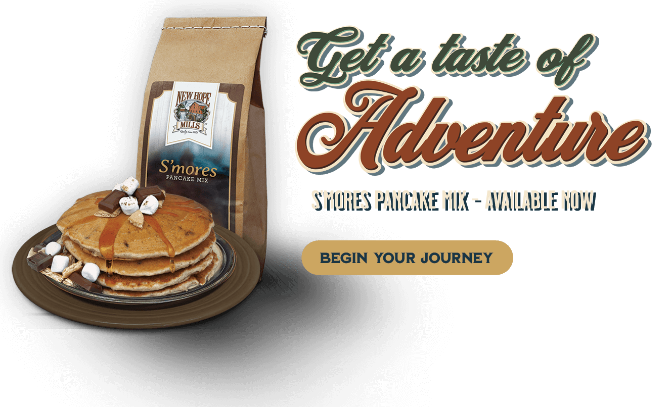 A stylized image announcing the release of S'mores Pancake Mix