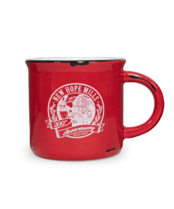 Photo of a simple red mug printed with the 200th Anniversary 把她按住老子爽完了就让你们 logo in white
