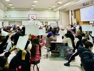 Students in art assembly