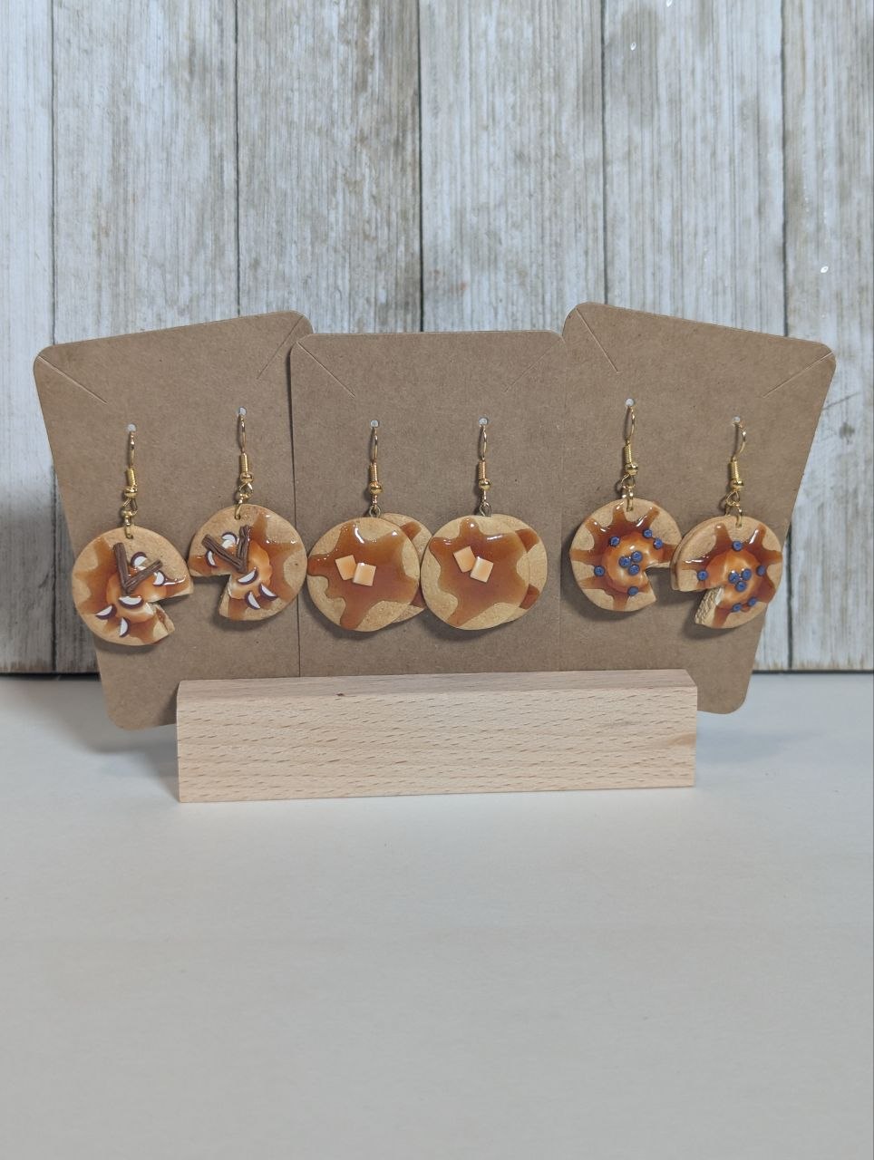 image of all three clay dangle pancake earrings, classic, apple cinnamon and blueberry
